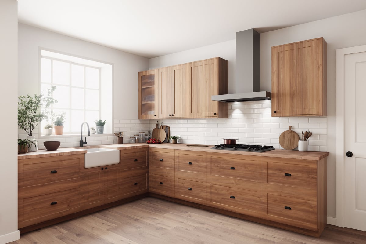 This stylish kitchen features wooden cabinets and modern appliances